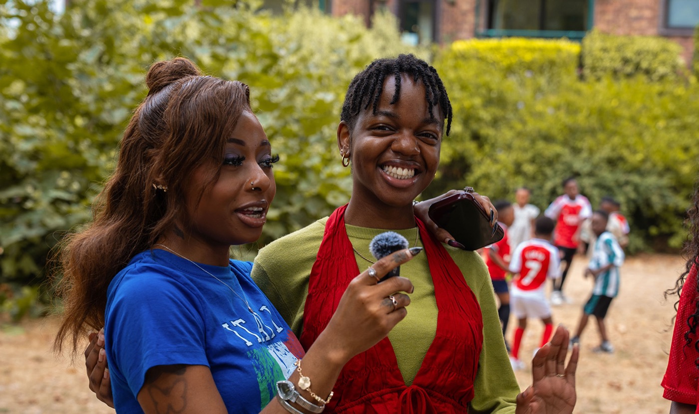 GLC London people smiling outdoors at a church gathering