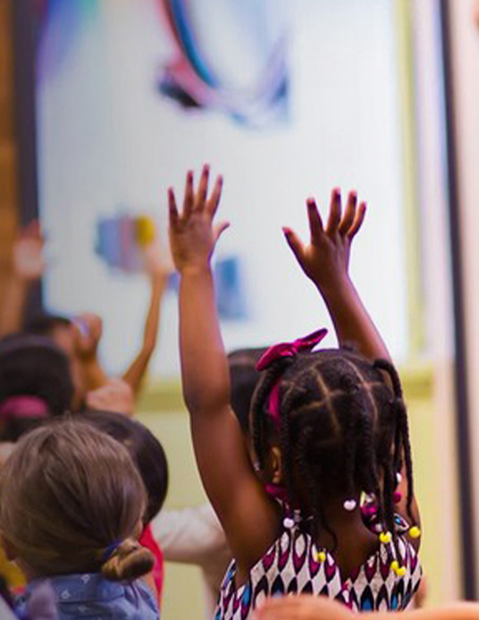 Children worshipping and engaging in a GLC kids session